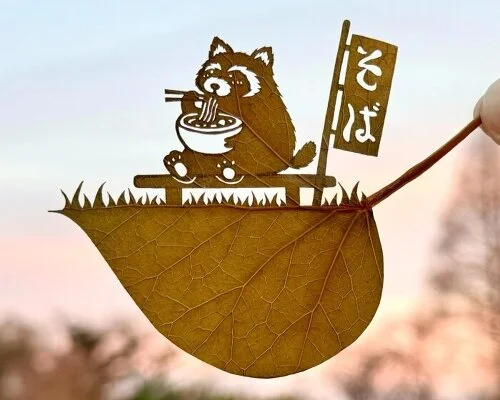 "Discover the Delight of Animal Silhouettes in Cut-Out Tiny Leaf Artworks"